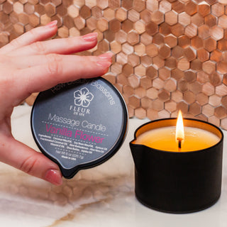 Fleur De Spa Massage Oil Candle for sensual and relaxing massage with pour spout and pump bottle. All Natural Coconut oil, safflower oil, soy wax, aloe, shea butter for sore muscles and couples. Fleur De Spa Massage oil voted number 1 women's health and Oprah favorite things. Award winning.